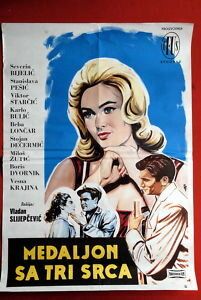 Постер фильма «Медальон с тремя сердцами»