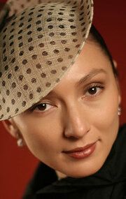 Елена Цай