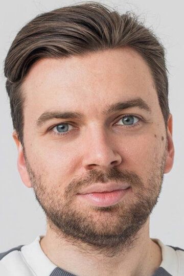 Роман Мельников